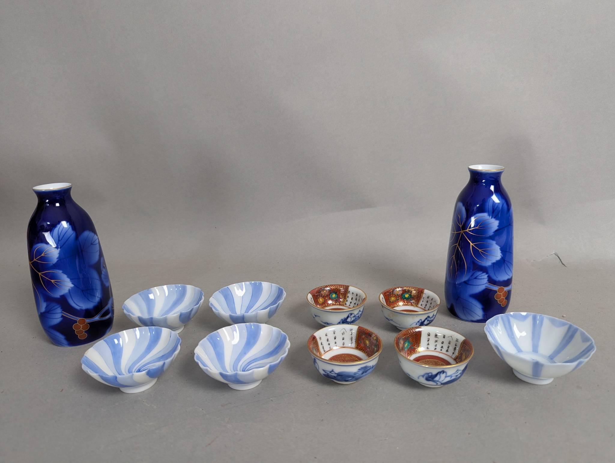 Japanese Sake Set with Bottles and Assorted Cups