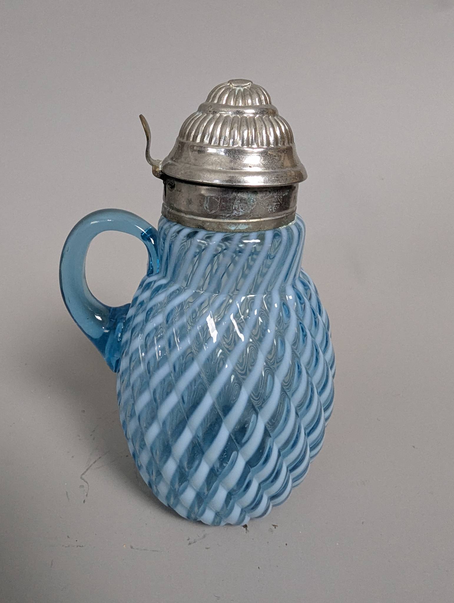 Antique Blue Opalescent Glass Syrup Pitcher in Buckeye Reverse Swirl Pattern