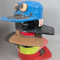 Pop Art Ceramic Sculpture of Stacked Hats with Cartoon Faces