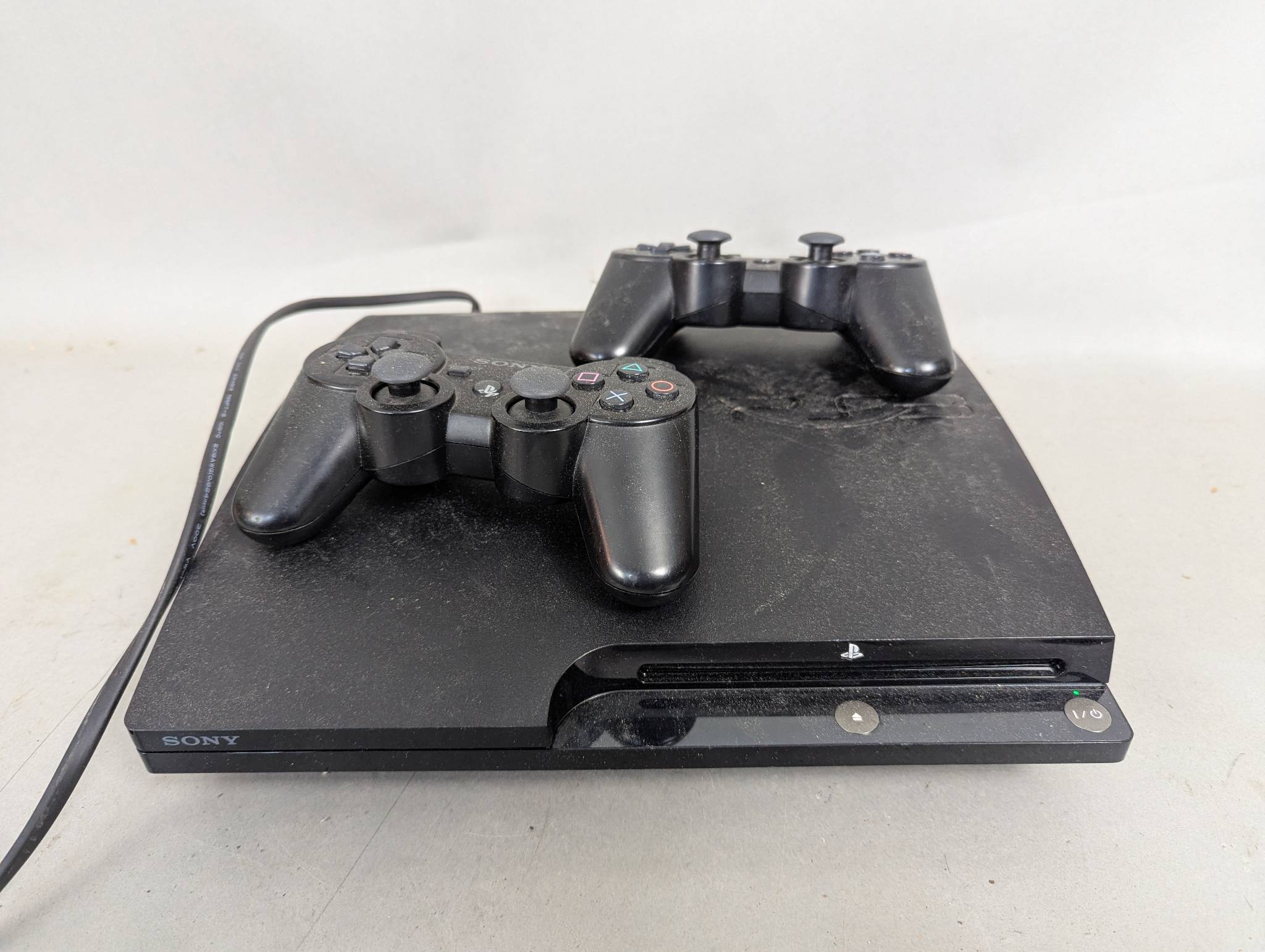 Sony PlayStation 3 Model CECH2001B with Two Controllers