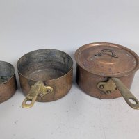 Three Matching Antique Copper Pots with Brass Handles and One Lid